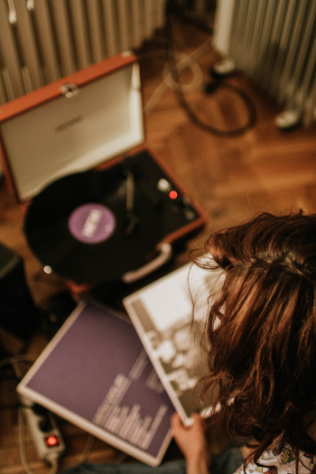 Person Holding Vinyl Sleeve Person Holding Vinyl Sleeve
