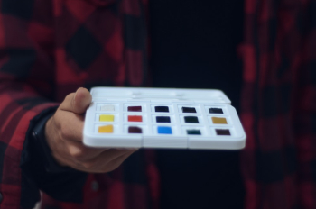 Person Holding Watercolor Person Holding Watercolor