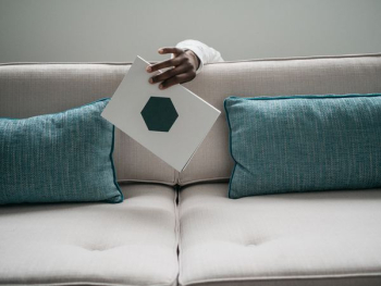 person holding white card person holding white card