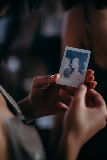 Person Holding Woman&#39;s Photo
