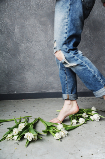 Person in Blue Ripped Jeans Person in Blue Ripped Jeans