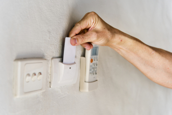 Person Inserting Magnetic Card In Reader Person Inserting Magnetic Card In Reader