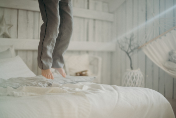 Person Jumping on Bed Person Jumping on Bed