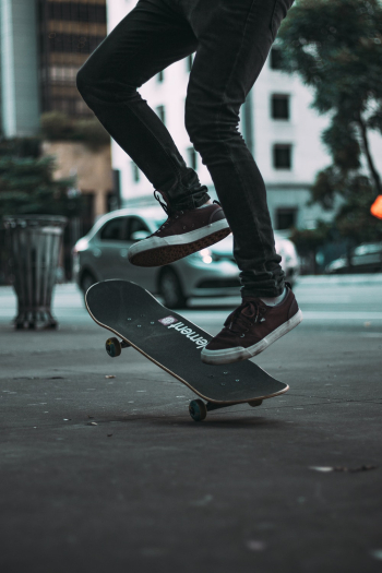 Person Kickflipping Person Kickflipping