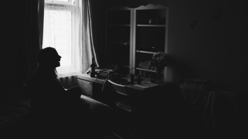 Person Laughing in Living Room Person Laughing in Living Room