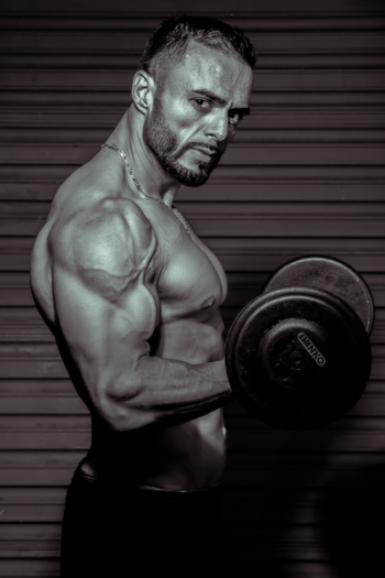 Person Lifting Dumbbell Person Lifting Dumbbell