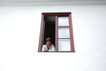 Person Looking Through Window Person Looking Through Window