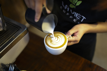 Person Making Cappuccino Person Making Cappuccino