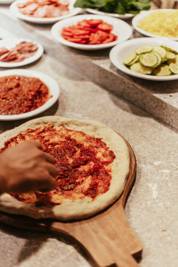 Person Making Pizza Person Making Pizza
