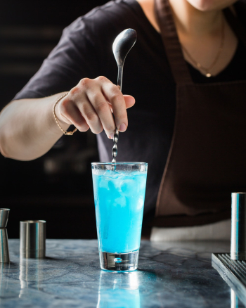 Person Mixing Drink Person Mixing Drink