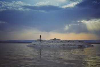 Person on Island during Sunset Person on Island during Sunset
