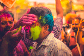 Person Painted the Face of Man Person Painted the Face of Man
