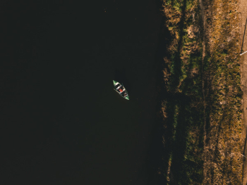 Person Riding Boat Person Riding Boat