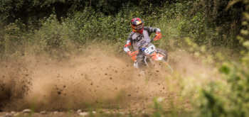 Person Riding Motocross Dirt Bike Person Riding Motocross Dirt Bike