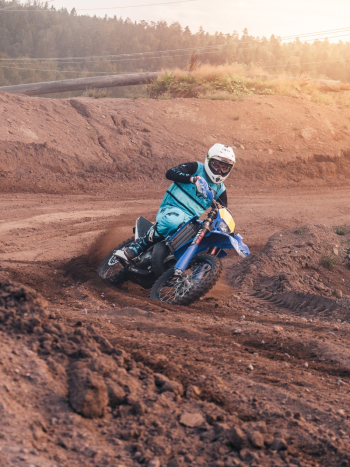 Person Riding on Motocross Dirt Bike Person Riding on Motocross Dirt Bike