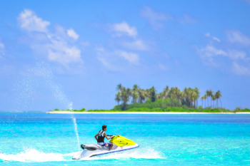 Person Riding on Personal Watercraft Person Riding on Personal Watercraft