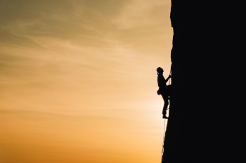 Person Rock Climbing Person Rock Climbing