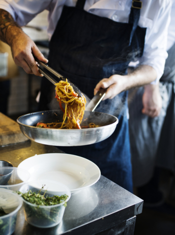 Person Serving Pasta Person Serving Pasta
