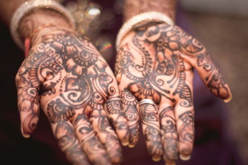 person showing hand tattoos person showing hand tattoos