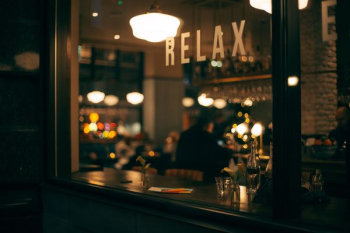 person sitting inside restaurant person sitting inside restaurant