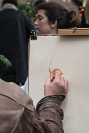 Person Sketching Woman&#39;s Face