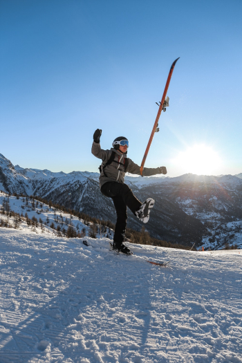 Person Skiing Under Blue Sky