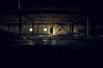 Person Standing In The Shadows Person Standing In The Shadows
