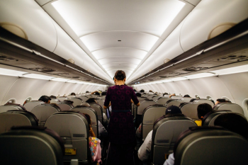 Person Standing Inside Airliner Person Standing Inside Airliner