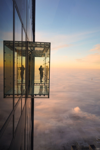 Person Standing on Balcony Person Standing on Balcony
