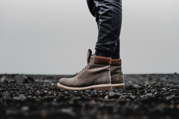 person standing on gravel person standing on gravel