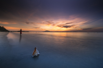 Person Standing on Shallow Water during Golden Hour Person Standing on Shallow Water during Golden Hour