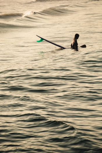 person swimming in the sea