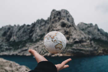 Person Tossing Globe Person Tossing Globe