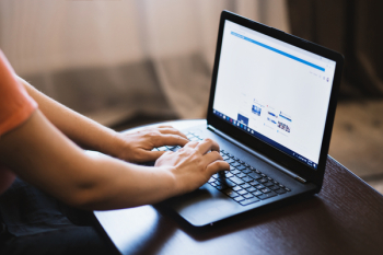 Person Typing on Laptop. Person Typing on Laptop.