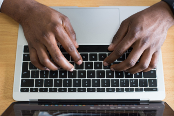 Person Typing on Laptop Person Typing on Laptop