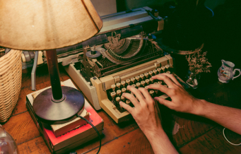 Person Typing On Typewriter Person Typing On Typewriter