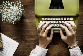 Person Typing On Typewriter Person Typing On Typewriter