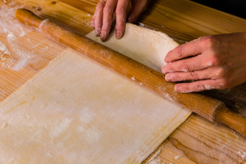 Person Using A Rolling Pin