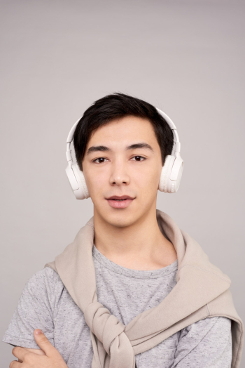 Person Using Headphone Person Using Headphone