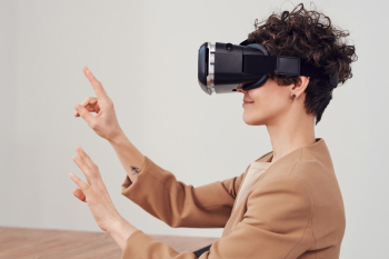 Person Using Virtual Reality Goggles Person Using Virtual Reality Goggles