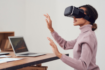 Person Using Virtual Reality Goggles Person Using Virtual Reality Goggles