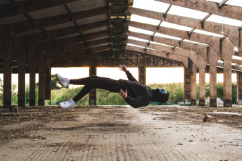 Person Wearing Black Hoodie Floating On Air Person Wearing Black Hoodie Floating On Air