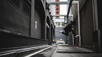 person wearing black pants and white shoes jumpshot person wearing black pants and white shoes jumpshot