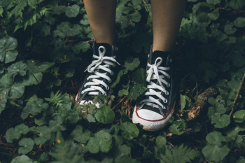 Person Wearing Black Sneakers Person Wearing Black Sneakers