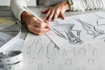 person writing a sketch art person writing a sketch art