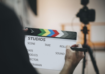 Person Writing Clapboard Person Writing Clapboard