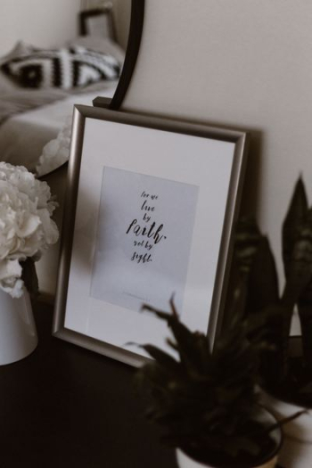 photo frame beside flowers photo frame beside flowers