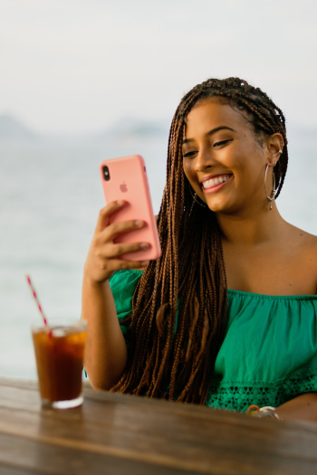 Photo of a Woman Using her Iphone Photo of a Woman Using her Iphone