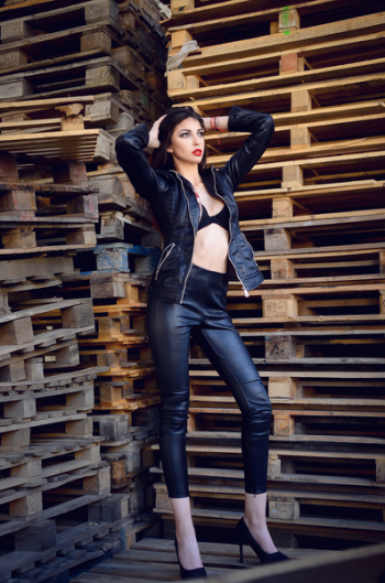 Photo of a Woman Wearing Leather Jacket and Pants Photo of a Woman Wearing Leather Jacket and Pants