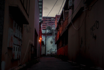 Photo of Alley Between Buildings Photo of Alley Between Buildings